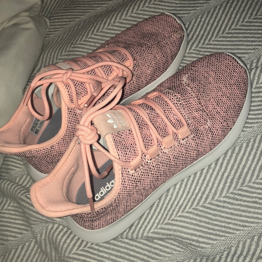 Pink adidas tubular tennis shoes